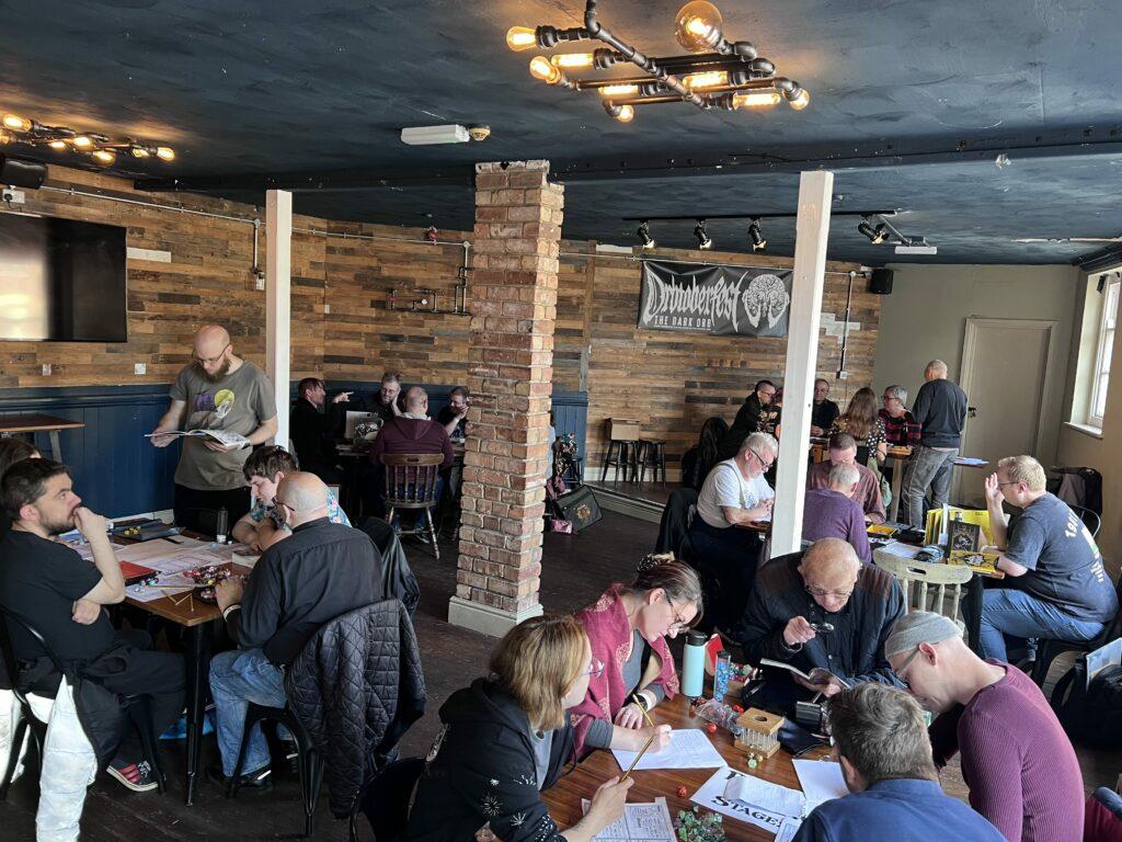 A packed night of tabletop games at a past Orbtoberfest